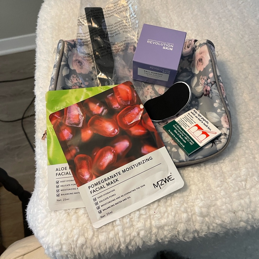 Make up bag with Pomegranate Facial Mask Set and revolution skin and more.